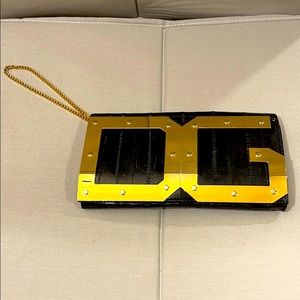 Dolce and Gabbana black gold logo clutch